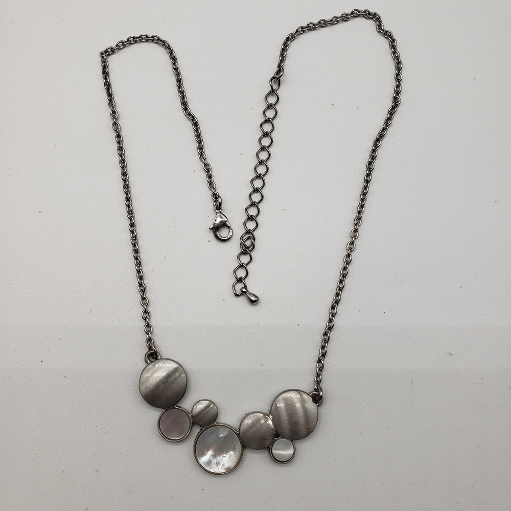 Elegant Silver Toned Necklace with Circular Accents